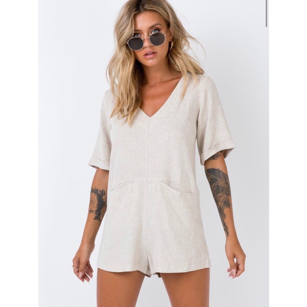 neutral colored romper.
